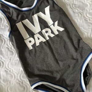 IVY PARK Kids Bodysuit in Gray with Blue and White Trim